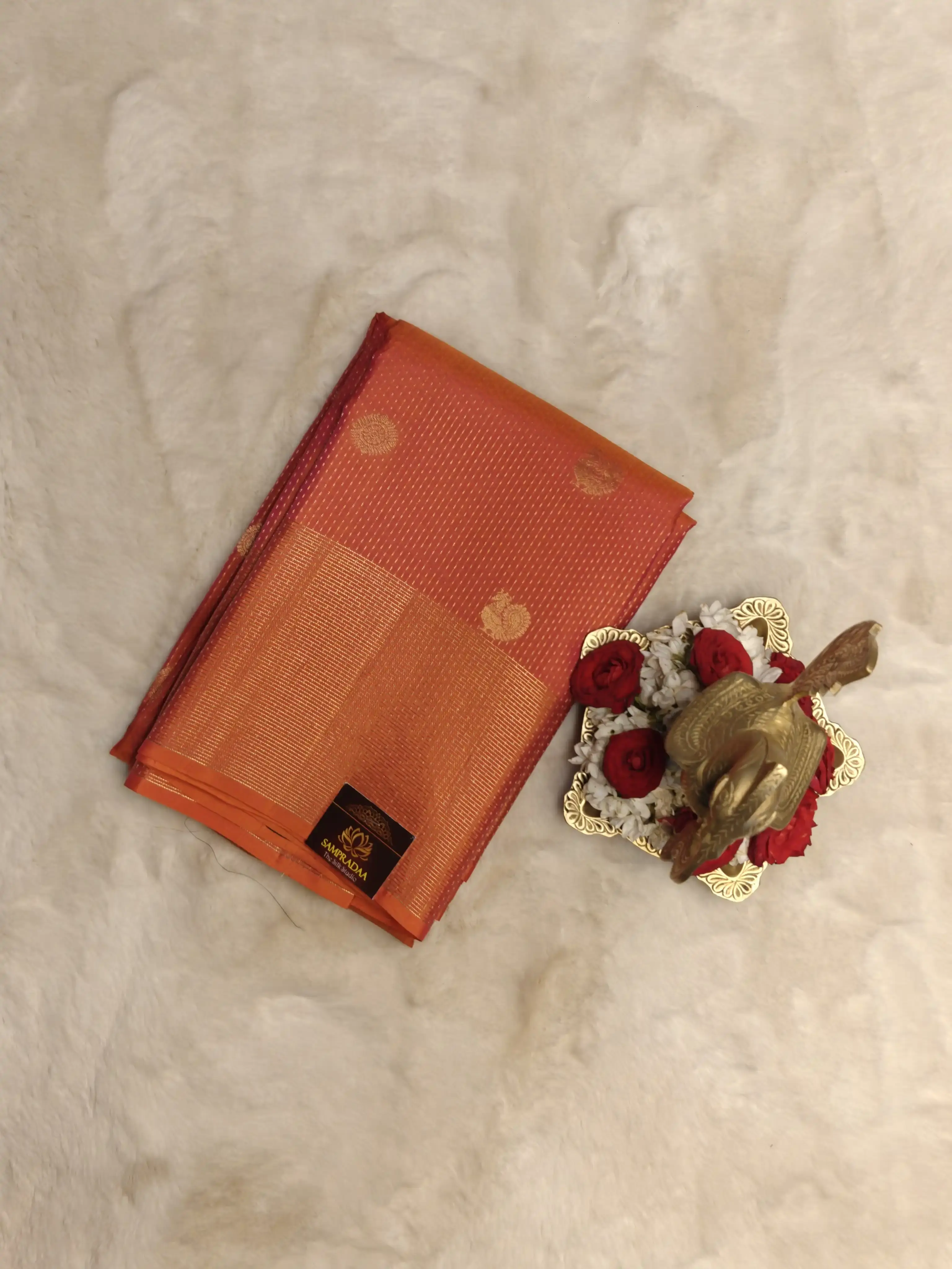 Orange Peacock motifs silk saree