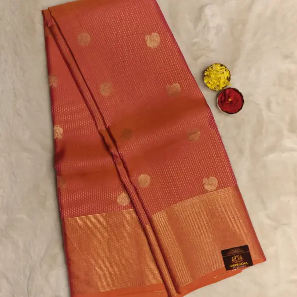 Orange Peacock motifs silk saree
