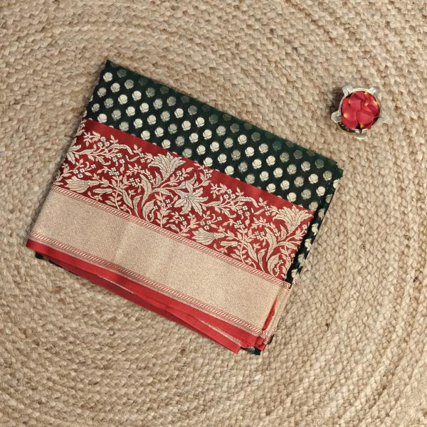 Green and red border with all over buttas benaras saree