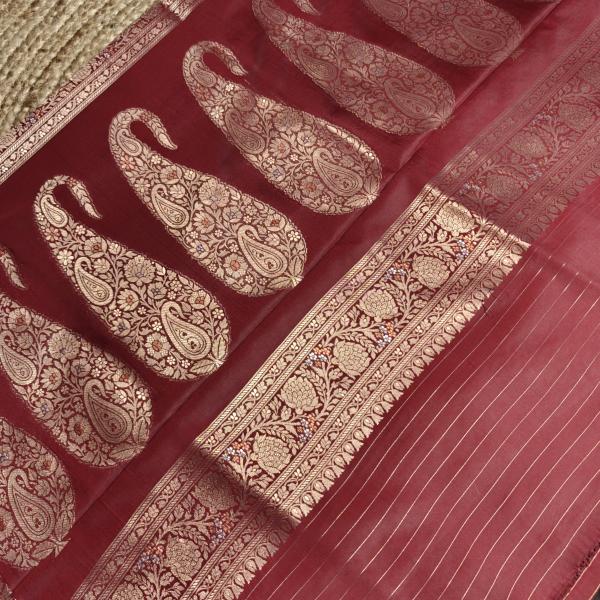 Maroon jaal work with rich border and pallu benaras saree