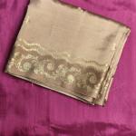 Beige with lehariya border raw mango saree