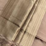 Beige with lehariya border raw mango saree