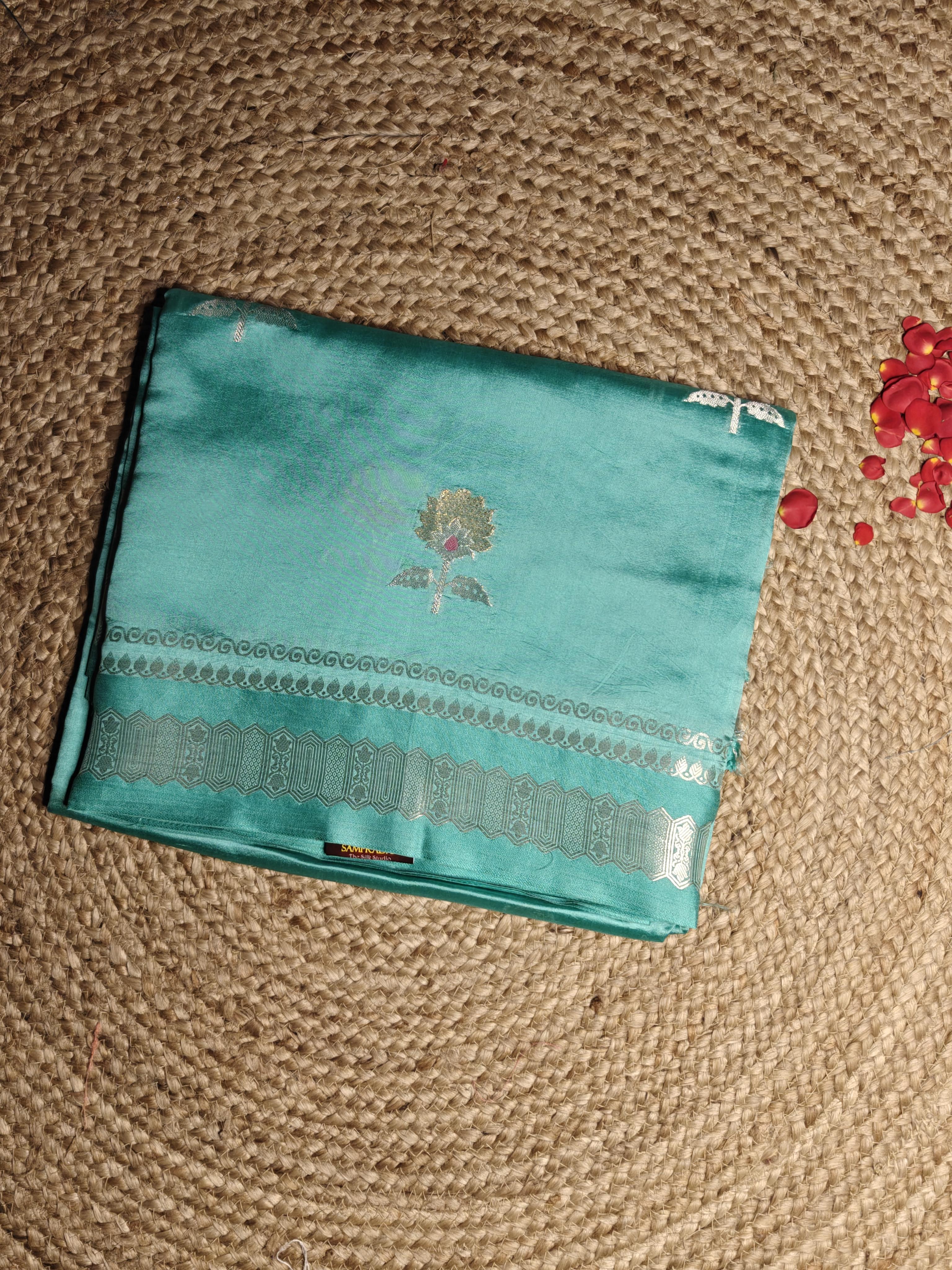 Sea green contemporary design raw mango silk saree