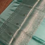 Sea green contemporary design raw mango silk saree