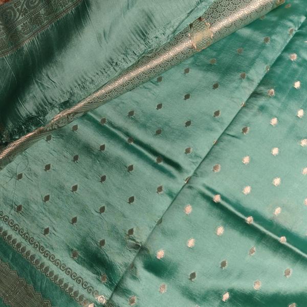 Sea green contemporary design raw mango silk saree