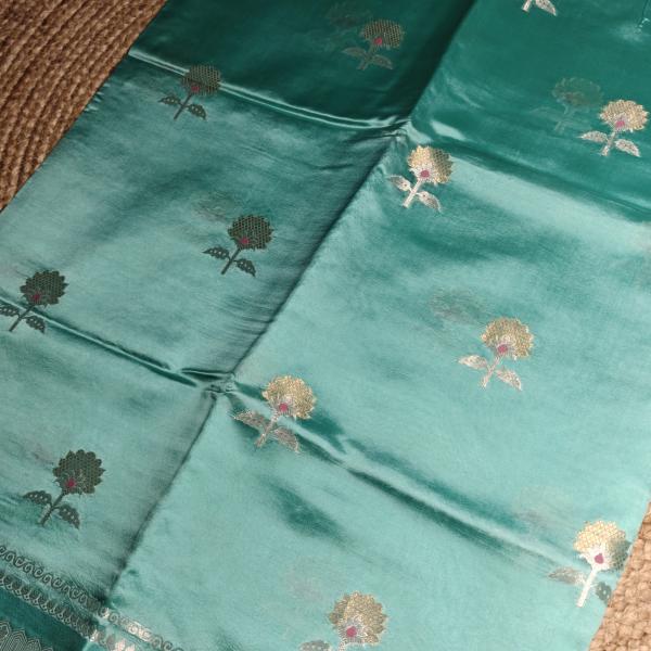 Sea green contemporary design raw mango silk saree